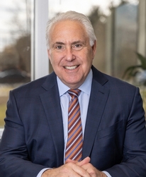 Headshot photo of Andrew J. Stamelman